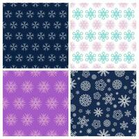 Seamless background with snowflakes. Set of four Christmas and New Year backdrops. Christmas decoration elements. Vector illustration.