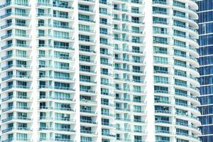 a tall building with many windows and balconies photo