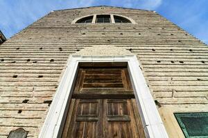 the door of the church of san giovanni in piazza photo