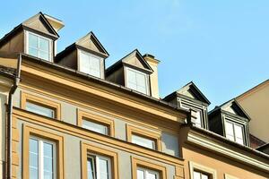 The historic house. Front wall of old tenement house photo