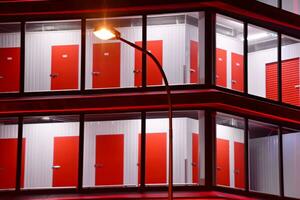 Pattern of office buildings windows illuminated at night. Glass architecture ,corporate building at night - business concept. photo