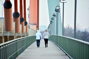 People walking on big city street, blurred motion crossing abstract photo