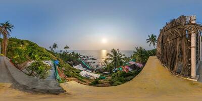 360 hdri panorama with coconut trees on ocean coast on mountain in equirectangular spherical seamless projection photo