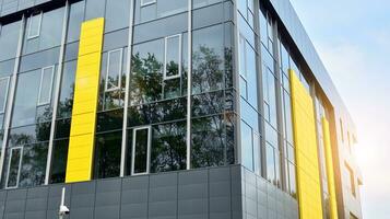 Modern building.Modern office building with facade of glass photo