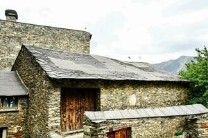 the old stone house in the mountains photo