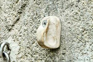 close up of a rock climbing wall photo