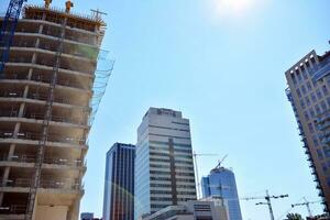 High-rise building under construction. Modern office building. photo