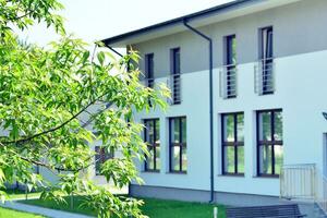 Modern office building in the city with windows and  steel and aluminum photo