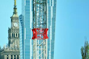 Crane attached to building photo