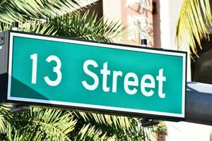 a street sign that says 13 street photo