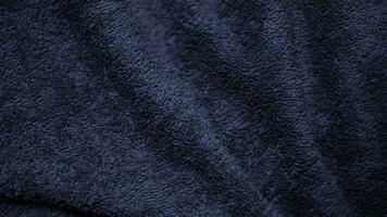 Dark blue velvet fabric texture used as background. Sky color panne fabric background of soft and smooth textile material. crushed velvet .luxury cobalt tone for silk. photo