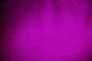 pinkvelvet fabric texture used as background. Violet color panne fabric background of soft and smooth textile material. crushed velvet .luxury magenta tone for silk. photo