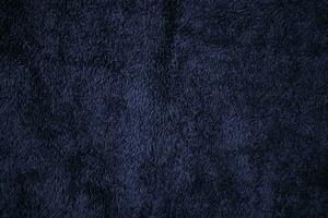 Dark blue velvet fabric texture used as background. Sky color panne fabric background of soft and smooth textile material. crushed velvet .luxury cobalt tone for silk. photo