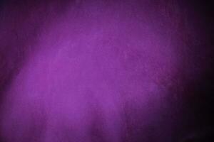 Dark purple velvet fabric texture used as background. Violet color panne fabric background of soft and smooth textile material. crushed velvet .luxury magenta tone for silk. photo