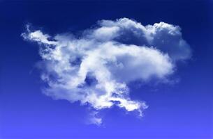 Single cloud shape isolated over blue background photo