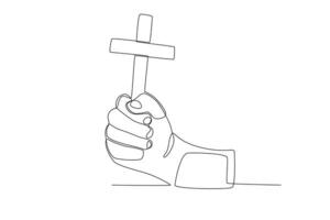 A hand holds a cross vector