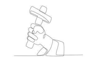 A hand holds a hammer vector