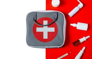 Emergency First Aid Kit, Medical Emergency Supplies for Health Care and Safety, Concept for Rescue and Treatment Support photo