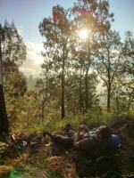 Batu, Indonesia. 7-05-2023. young people climbing the mountain, One of the best views when climbing Mount Bhutak. photo