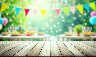 Empty wooden table with party on blurred garden background photo