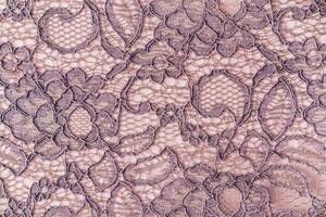 Vintage lace in delicate coffee color with floral patterns. Abstract holiday background or lace pattern design. Luxury dress textiles. mockup. photo
