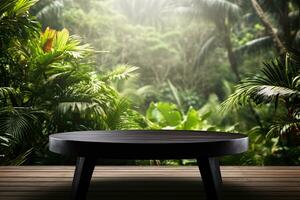 round tray made of dark burnt wood for the presentation of products. against the background of palm trees and various tropical plants photo