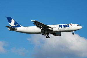 Istanbul, Turkey, 2019 - MNG Airlines Airbus A300 TC-MCG cargo plane arrival and landing at Istanbul Ataturk Airport photo