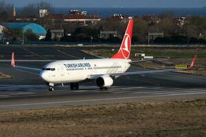 Istanbul, Turkey, 2019 - Turkish Airlines Boeing 737-800 TC-JHS passenger plane departure at Istanbul Ataturk Airport photo