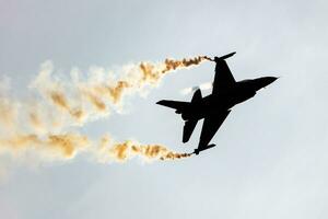 Radom, Poland, 2023 - Belgian Air Force Lockheed F-16 Fighting Falcon fighter jet plane flying. Aviation and military aircraft. photo