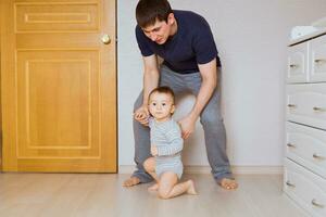 Happy family father and baby child son indoors photo