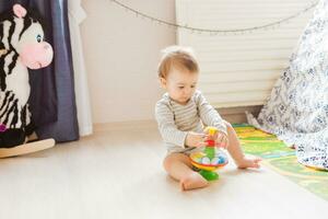 Cute caucasian baby boy indoors photo