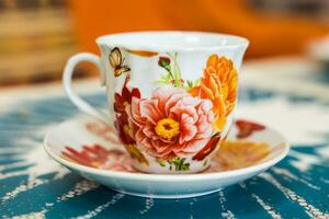 Colorful cup on a colored background photo