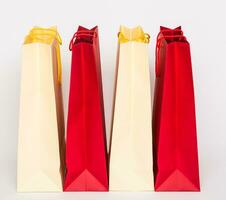 Paper shopping bags on white background photo
