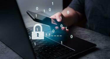 Woman use smartphone and laptop for protection with two factor authentication. Cybersecurity and privacy protect data. Personal online privacy. Cyber hacker threat. photo