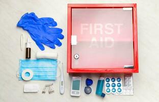 Emergency First Aid Kit, Medical Emergency Supplies for Health Care and Safety, Isolated for Rescue and Treatment Support photo