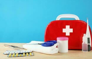 Emergency First Aid Kit, Medical Emergency Supplies for Health Care and Safety, Isolated for Rescue and Treatment Support photo