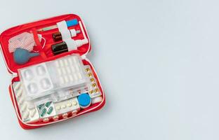 Emergency First Aid Kit, Medical Emergency Supplies for Health Care and Safety, Isolated for Rescue and Treatment Support photo