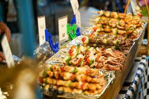 Barbeque street food in walking street Lampang, Thailand photo