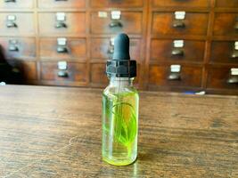 Cannabis oil in bottles at Chinese herb store. photo