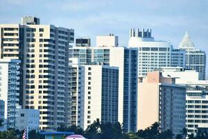 tall buildings against a blue sky photo