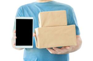 Man with packages and tablet screen photo