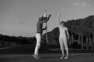 People playing golf photo