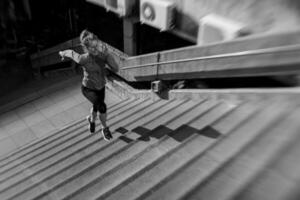 Woman exercising - black and white photo