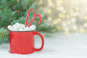Christmas background with Christmas drink and candy canes photo