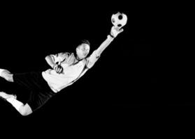 Man playing soccer photo