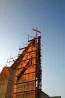 a large building with scaffolding on it photo
