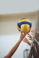 Girl playing volleyball photo