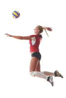 mujer jugando voleibol foto