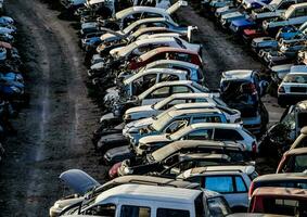 a large number of cars are parked in a lot photo