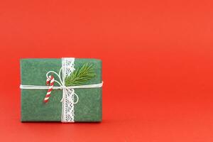 Christmas background with green gift box photo